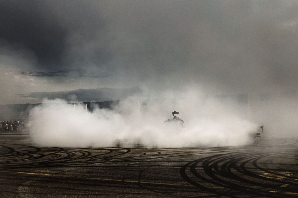 Red Bull Driftbrothers (NL) burning out tyres, covered in smoke
