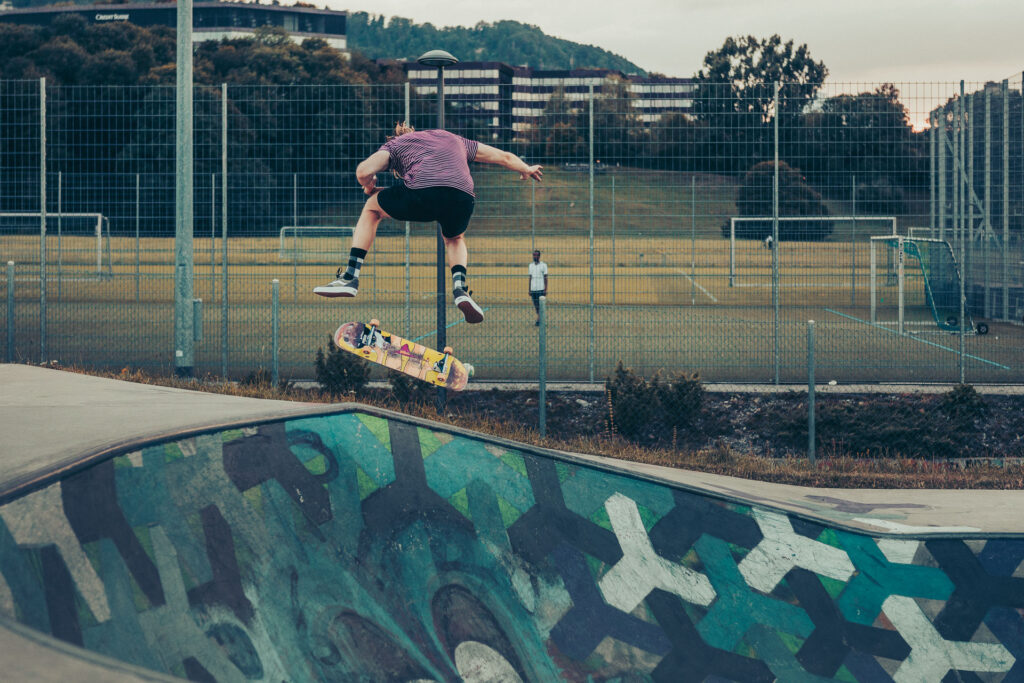 Skateboarder ollie at skatepark Allmend by Ondrej Kolacek