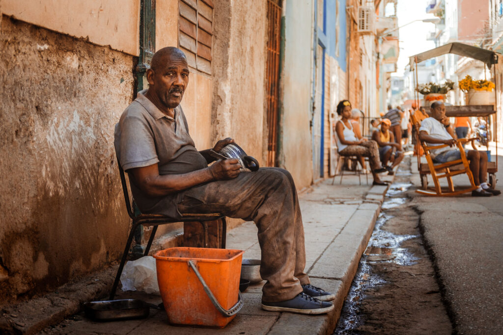 A bunch of street sellers on the streets of havanna by ondrej kolacek