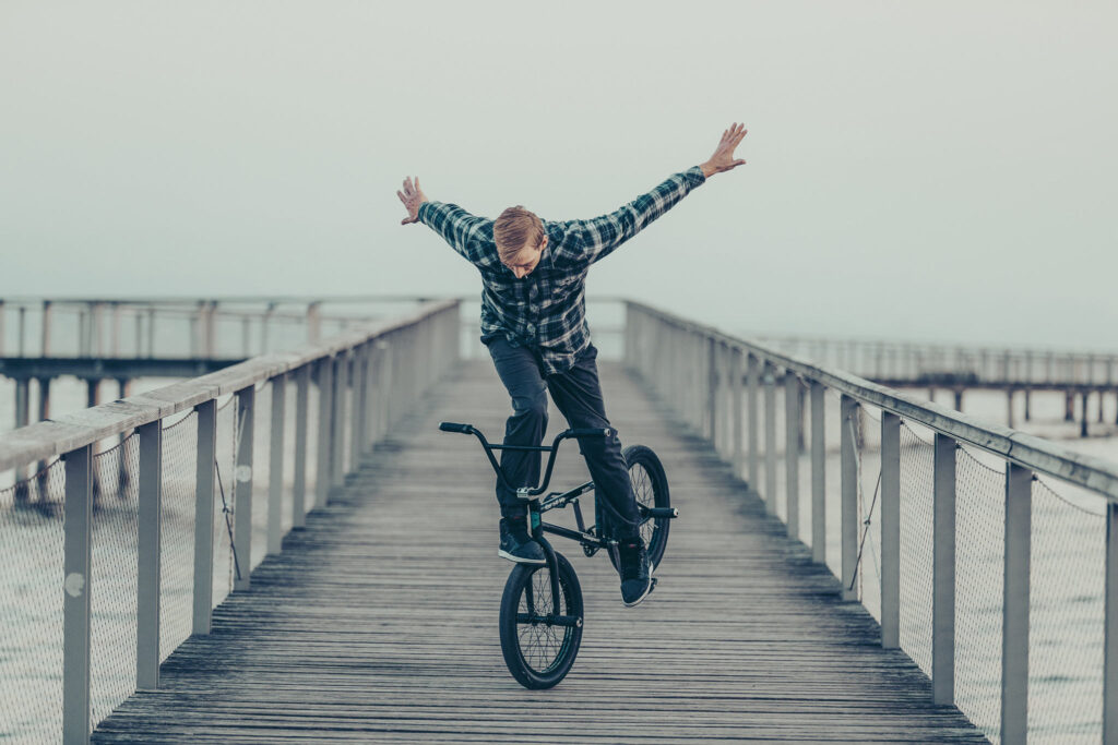 Enviromental portrait of Dan Henning, professional bmx flatland rider at Rote Fabrik - Zurich, Switzerland by Ondrej Kolacek