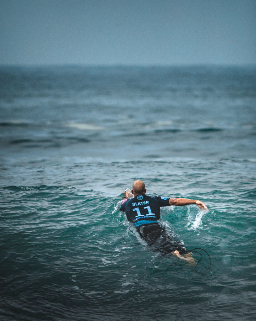 Pro Surfer Kelly Slater (USA) is paddeling out
