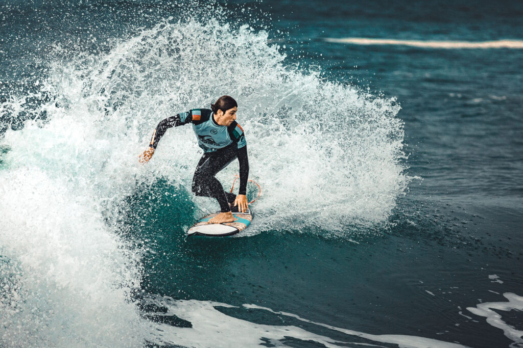 Pro Surfer Leonardo Fioravanti (IT) at the Quicksilver Pro France Contest, water is splashing.