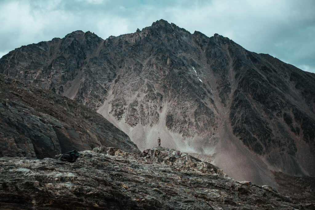 Hiking up to the glaciar martial ushuaia, view on the mountains. Little stone artwork visible by Ondrej Kolacek