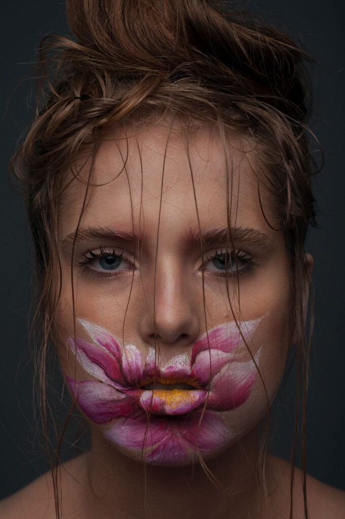 Face covered with a flower painting retouched |MUA Daria Bogatova, MODEL Kate Cherenova, PHOTO Anna Doctor unretouched