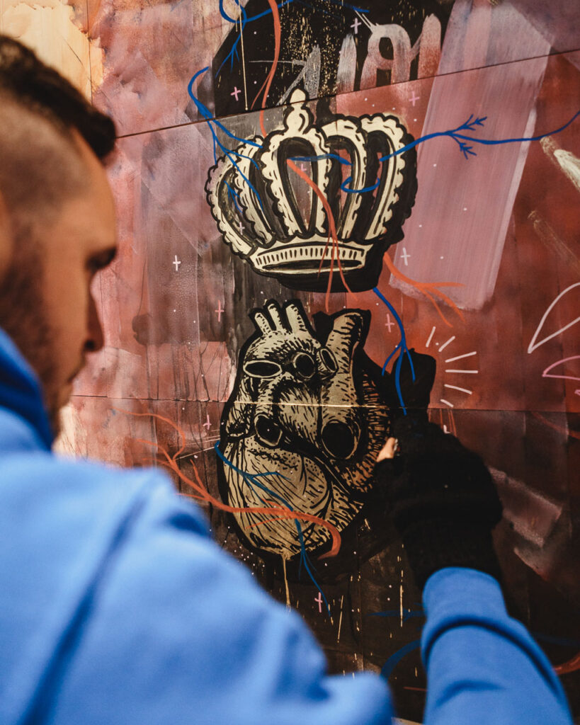 Street artist Tens painting at Artacks & Artstübli by Ondrej Kolacek