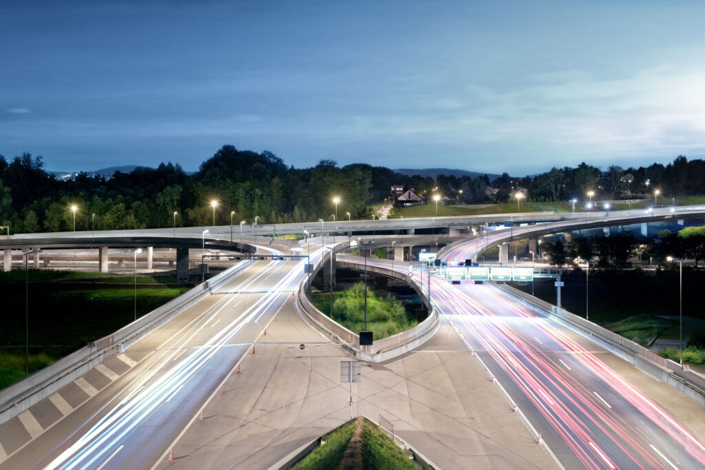 Highway at night, with lighttrails retouched