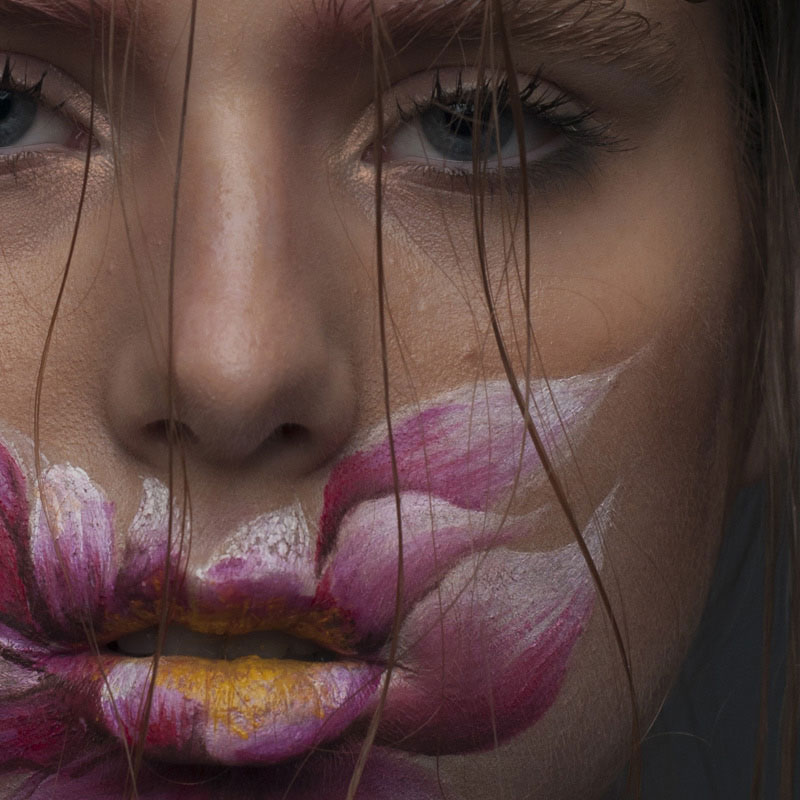 Face covered with a flower painting retouched | MUA Daria Bogatova, MODEL Kate Cherenova, PHOTO Anna Doctor unretouched